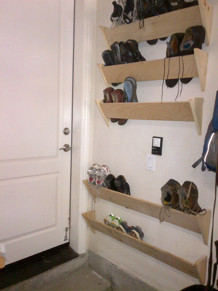homemade shoe racks for our garage walls by the house entrance