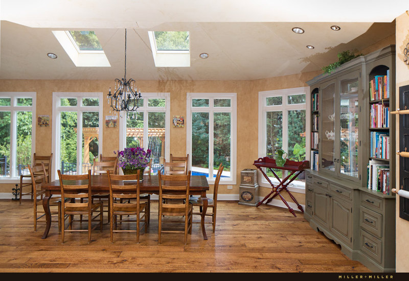 bright sun-filled kitchen overlook pool backyard