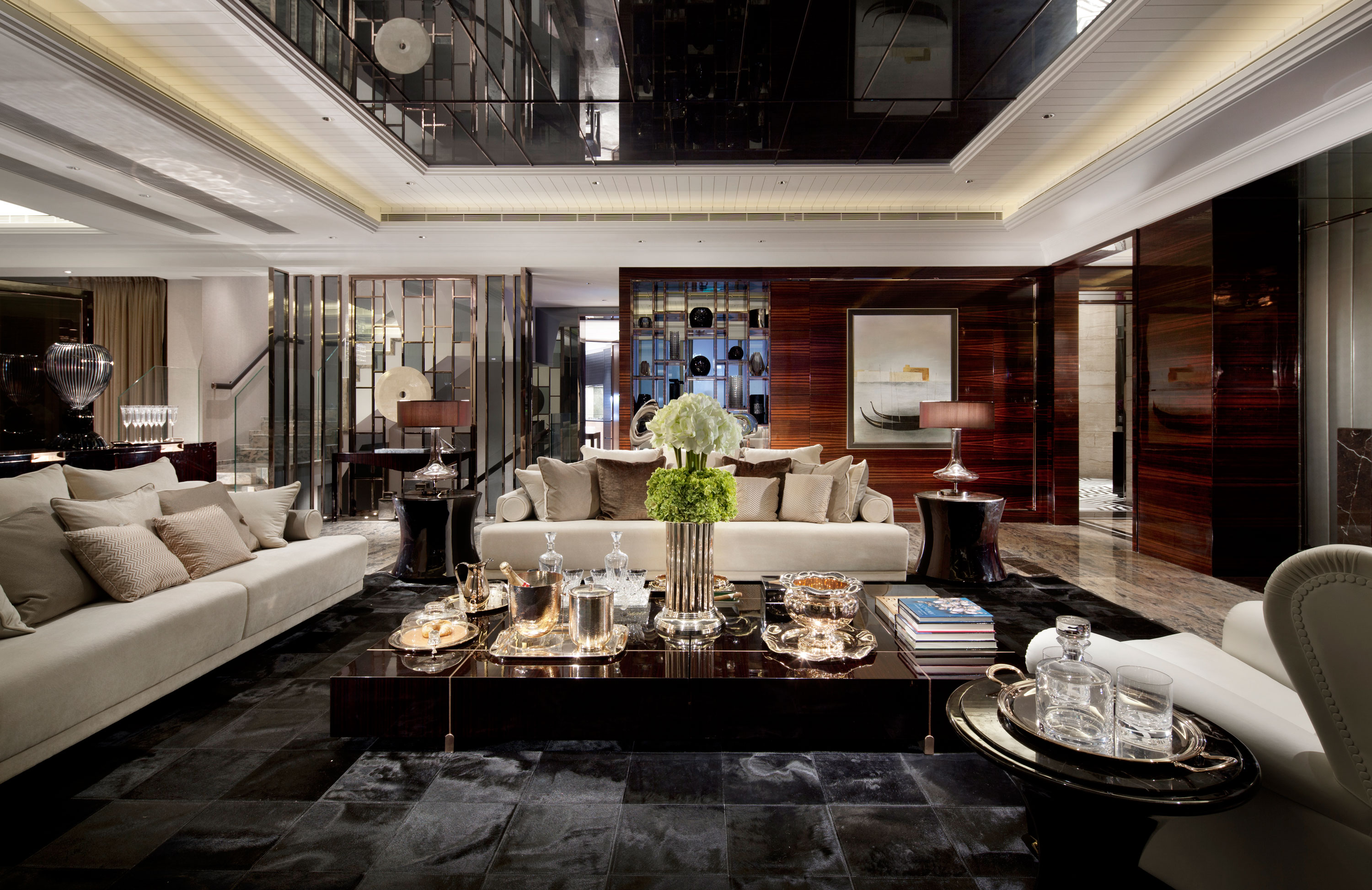 high gloss slate tiles varnished dark wood walls luxury living subtle mulberry and cream accessorized modern living