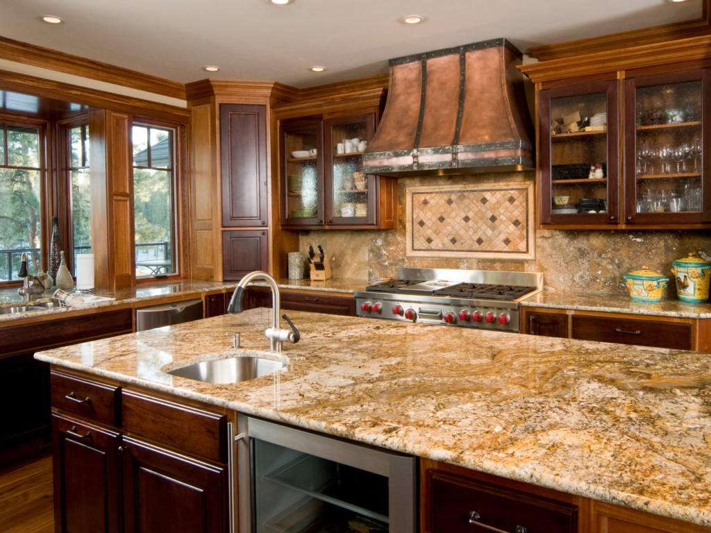 Kitchen cabinets with granite countertops and stainless steel vanity