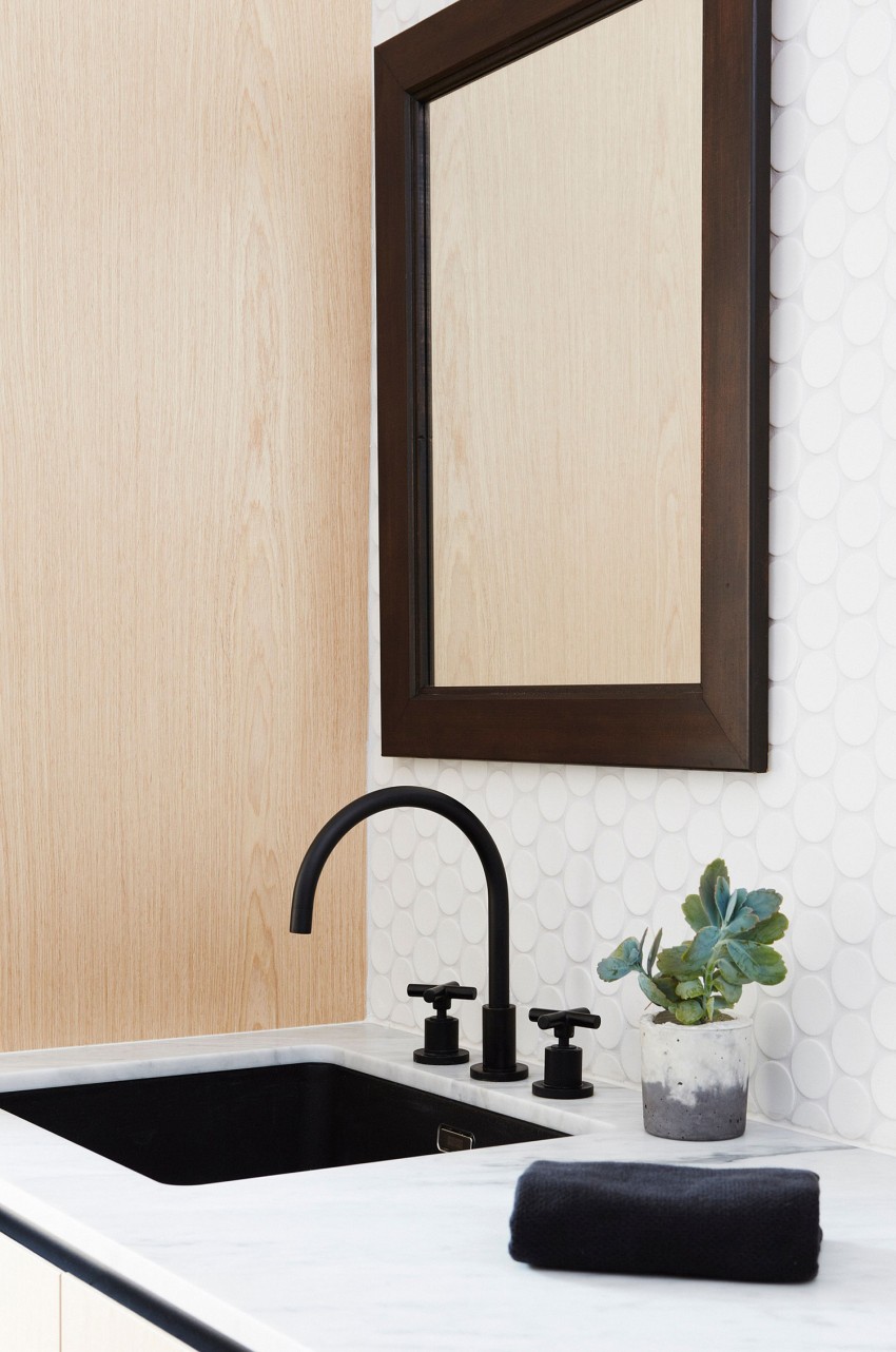 vintage-ikea-bathroom-wood-frame-mirror-white-polka-dots-tile-backsplash-black-undermount-basin