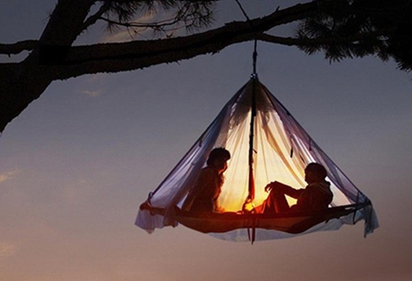 suspended king bed outdoor hanged in tree