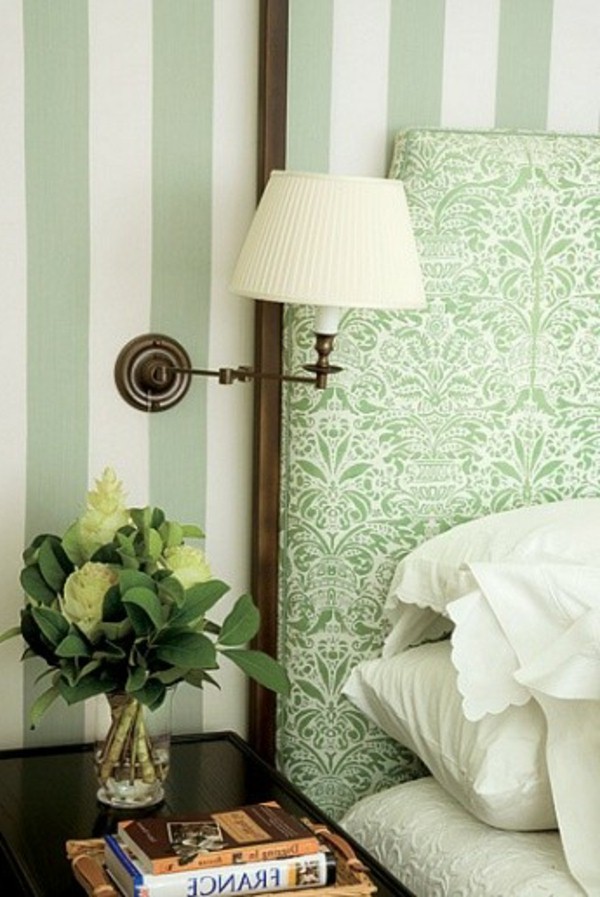 Wall behind bed headboard bed green lamp