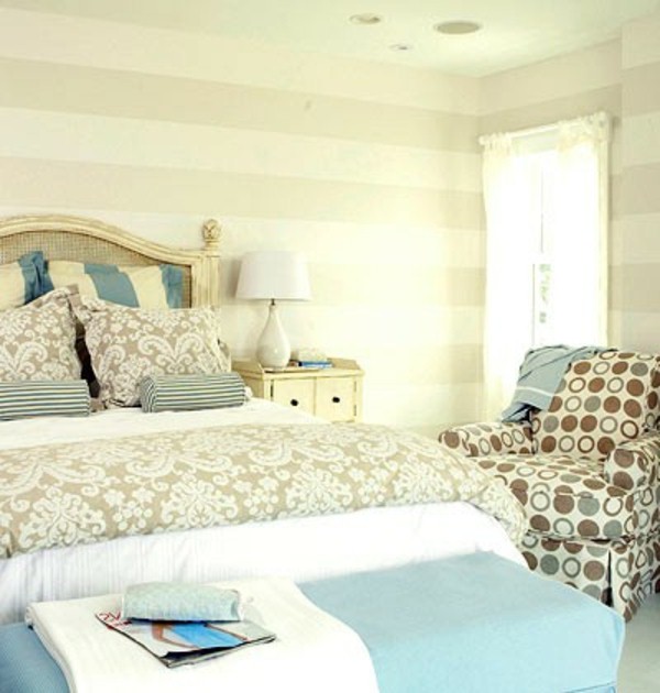 Wall behind bed headboard bed patterned sofa