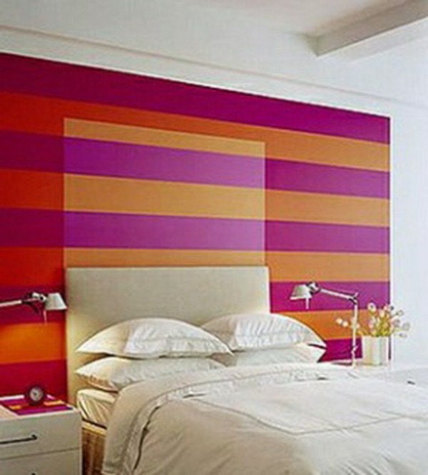 Wall behind bed headboard bed pink yellow lamp