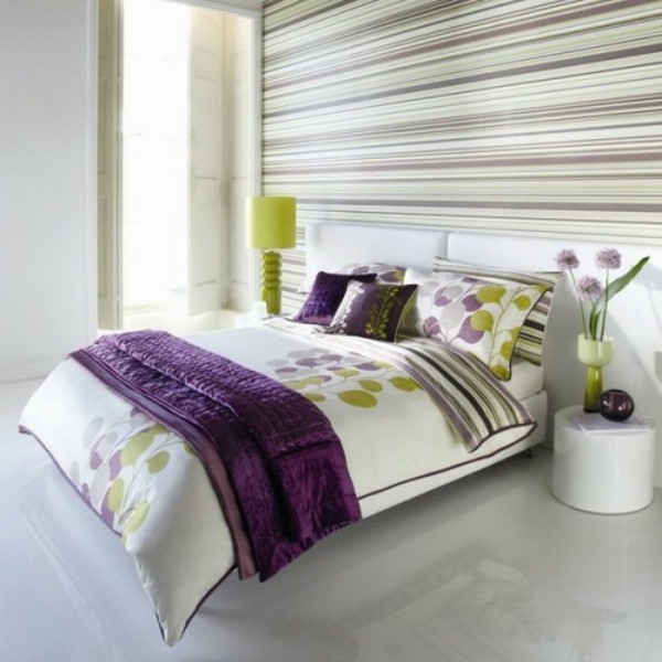Wall behind the headboard bed horizontal stripes purple lamp