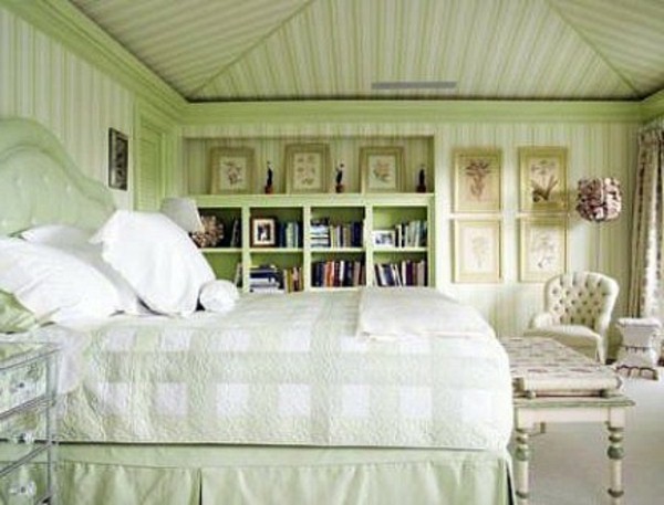 Wall behind the headboard shelves sofa bed green paper