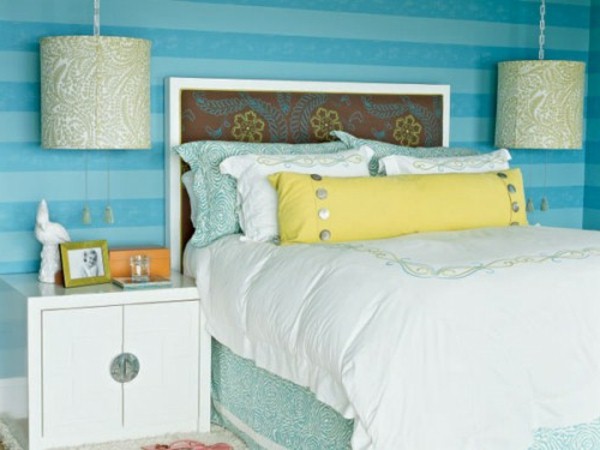 Wall behind bed headboard bed blue bedside chandelier