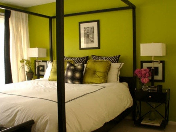 green wall design for bedroom with a nice bed