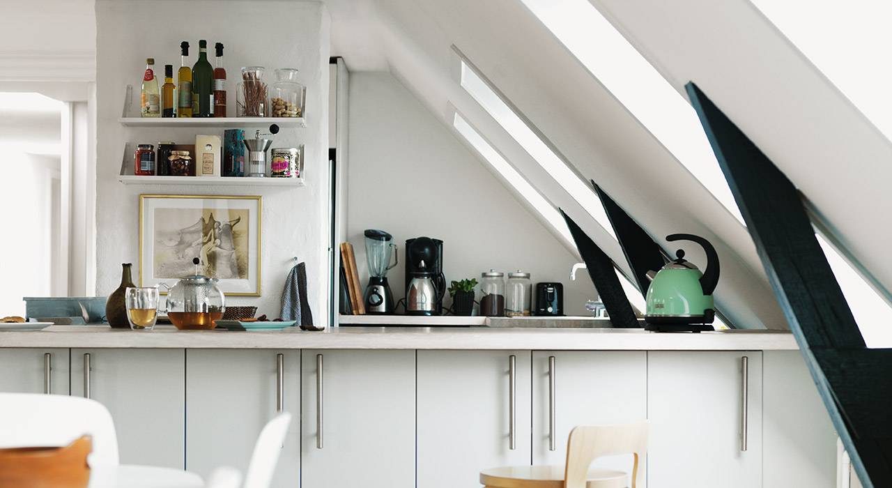 Attic kitchen and great roof windows which make room brightly