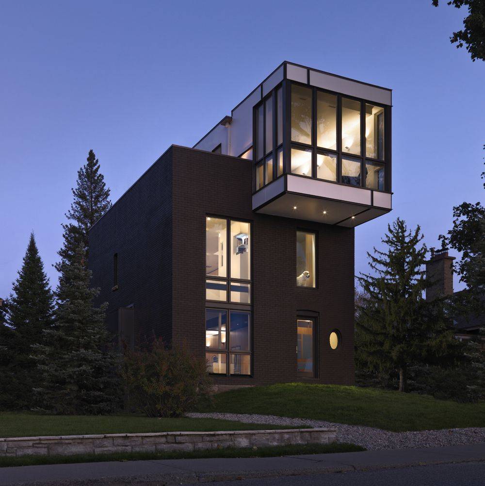 Awesome minimalist style ultra modern house with black concrete wall and large windows and flat roof