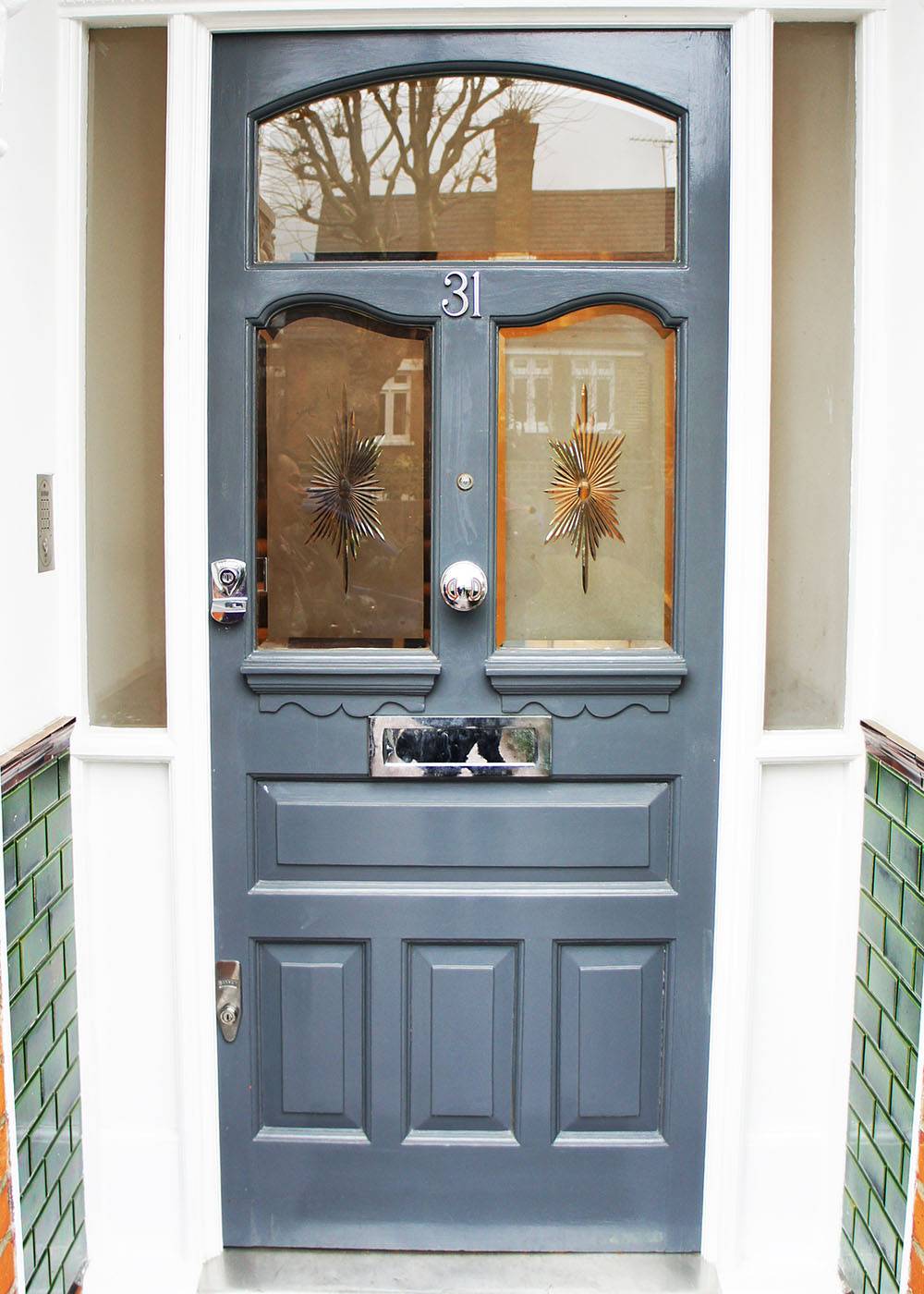 Impressive solid wood front door with glass