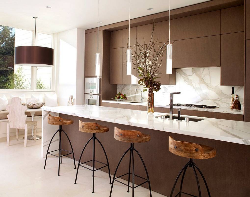 Kitchen with hidden cabinets and simple dining area