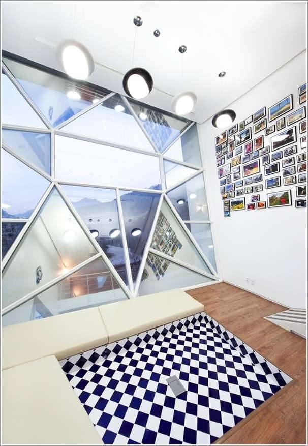 Unusual geometric shaped window design for living room