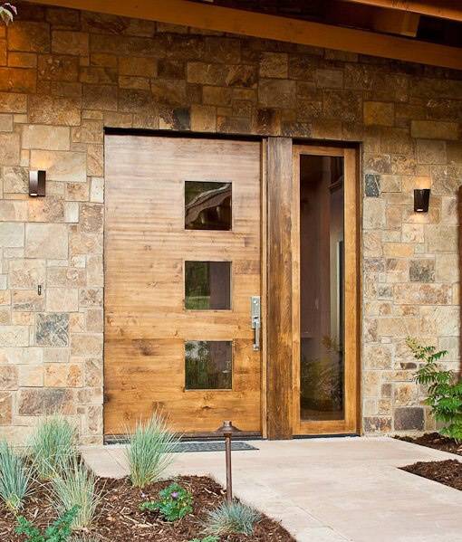 contemporary front door with stone