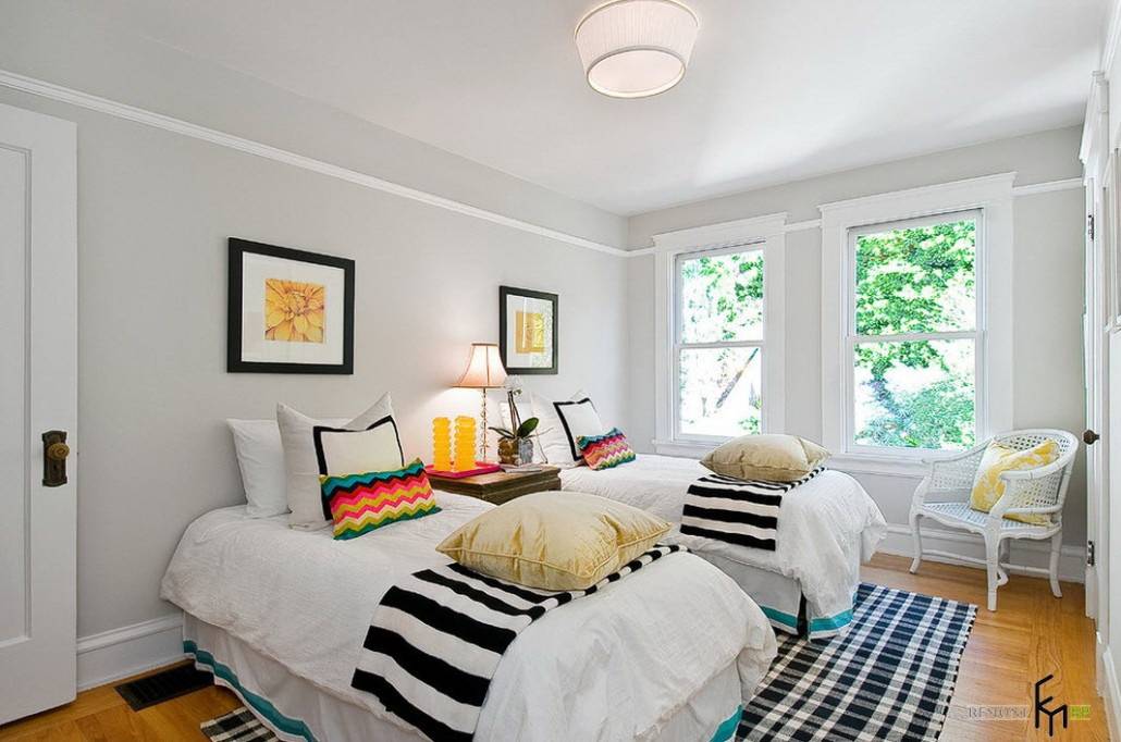Enchanting small bedroom for children in smoky gray wall color with lovely twin beds and wide windows decoration
