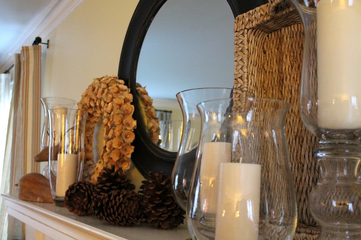 mantel decorated with pinecores
