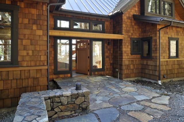 rustic-entry-new-front-door-shingles-ridge-gravel-lantern