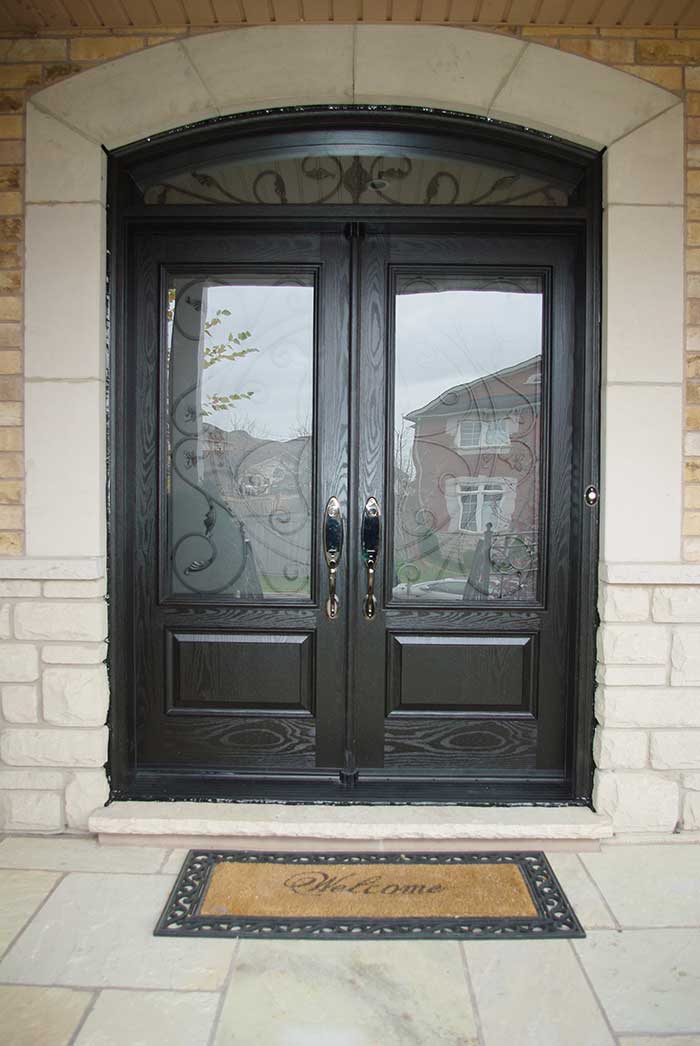 surprising-custom-fiberglass-doors-with-glass-panels-woodgrain-double-iron-art-glass-design-front-door-with-nice-matching-arch-ransom-installed
