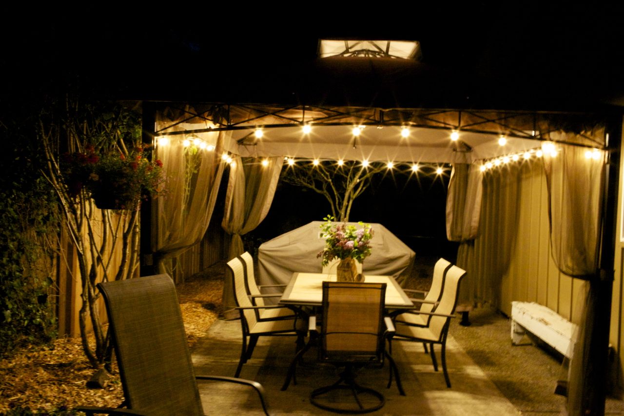 wonderful outdoor gazebo lights decorating ideas with a flower pot centerpieces on table include arm dining chairs as well as exterior lighting ideas plus outdoor lighting fixtures