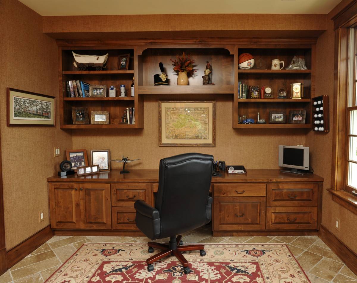 classic style small home office with solid wood furniture and bookcases