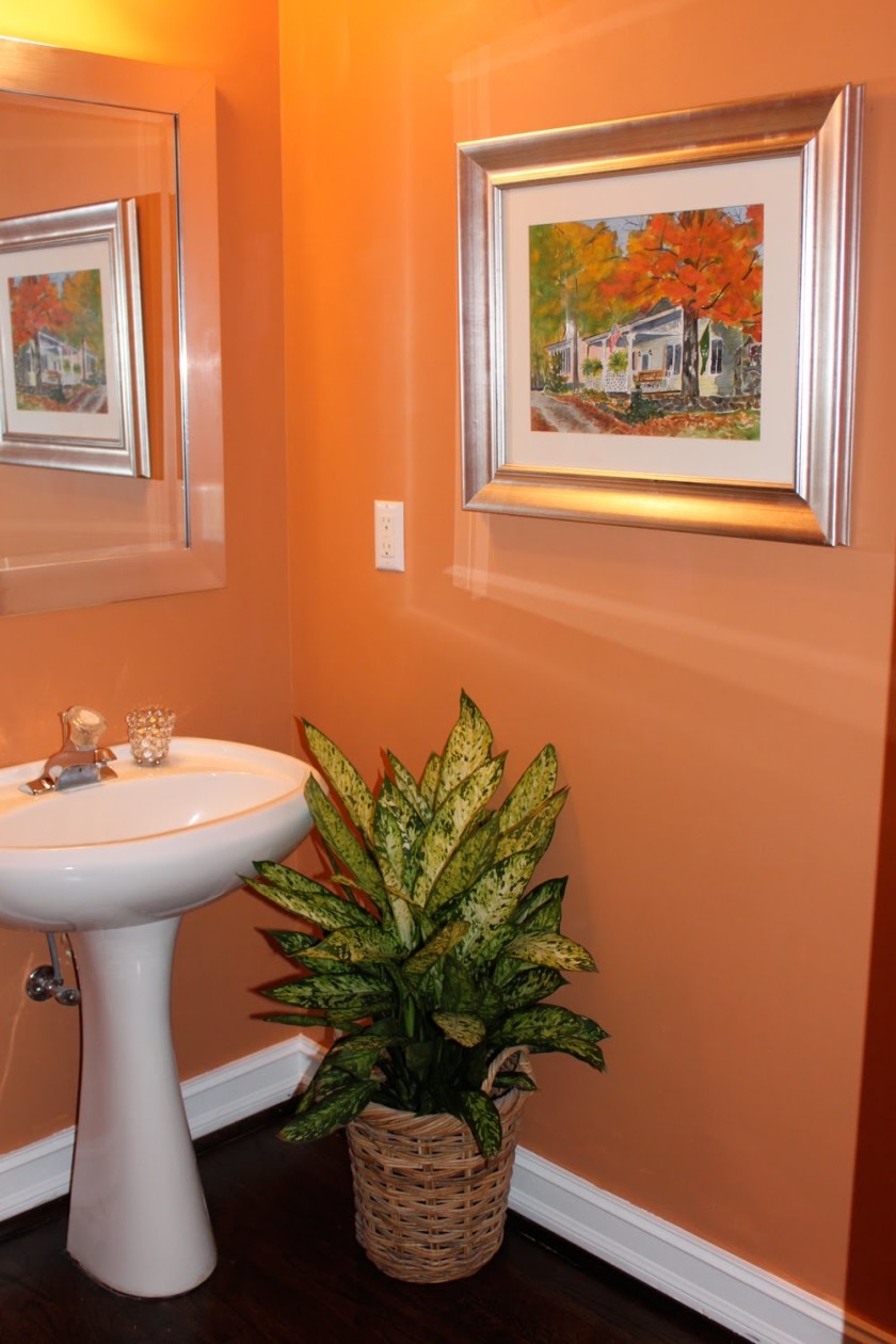 Bathroom, Awesome Modern Powder Room Designs 2010 Charming Orange Color Wall Stainless Glass Modern Powder Room Paint Small Design Be Equipped Sink Wall Mirror Wood Floor Wallmount Picture Flower Pot At Bathroom With Kitchen Designs And Contemporary Furniture