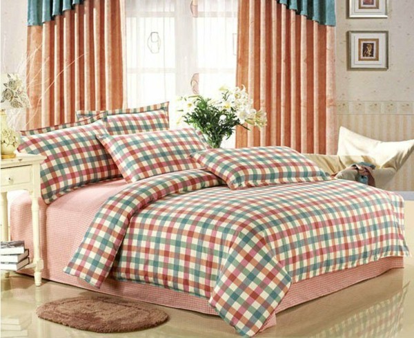 peach colored bed linen and pillow