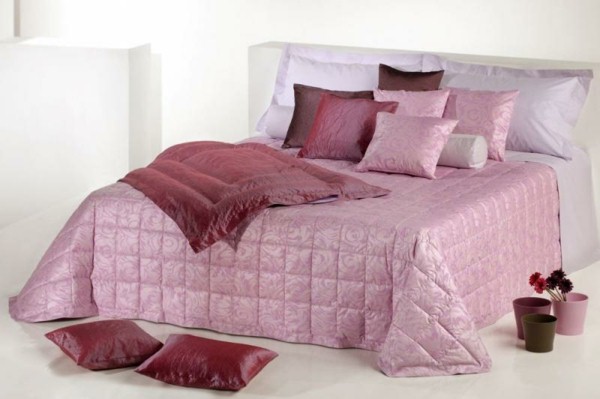 purple bed linen in white bedroom