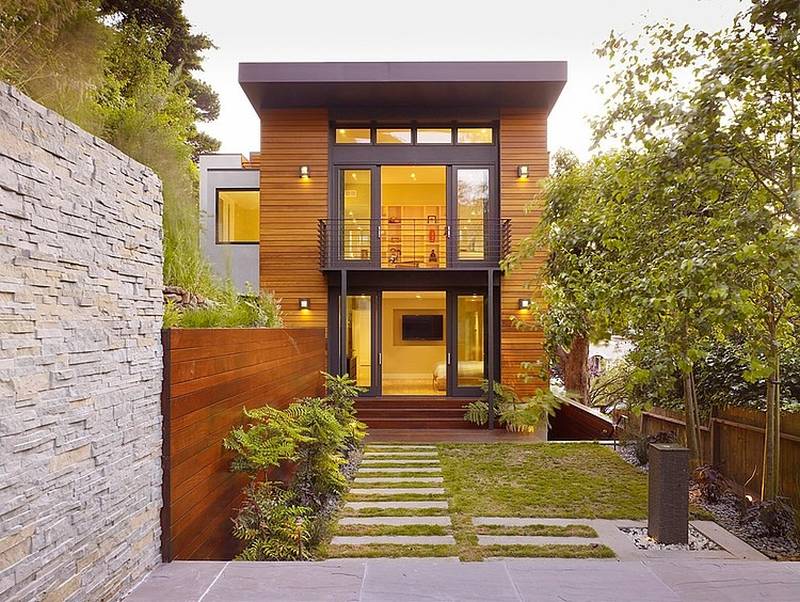 Modern house on the hillside with simple backyard