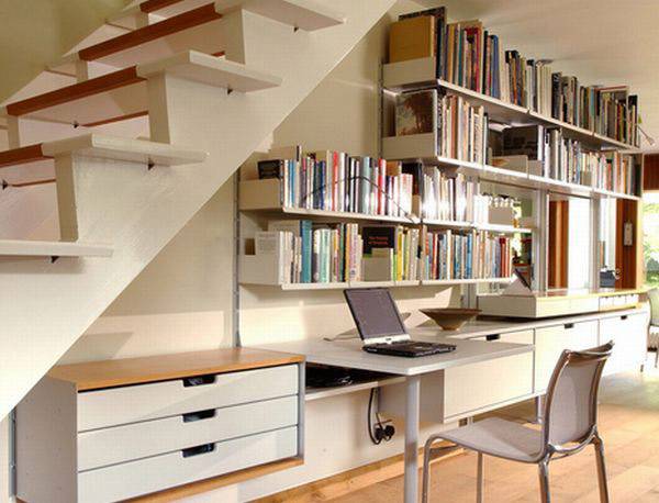 Bookshelves in the staircase as a great idea of space-saving techniques