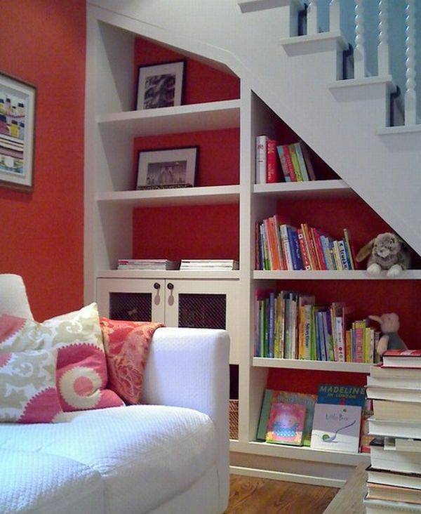 Bookshelves in the staircase as a great idea of space-saving techniques