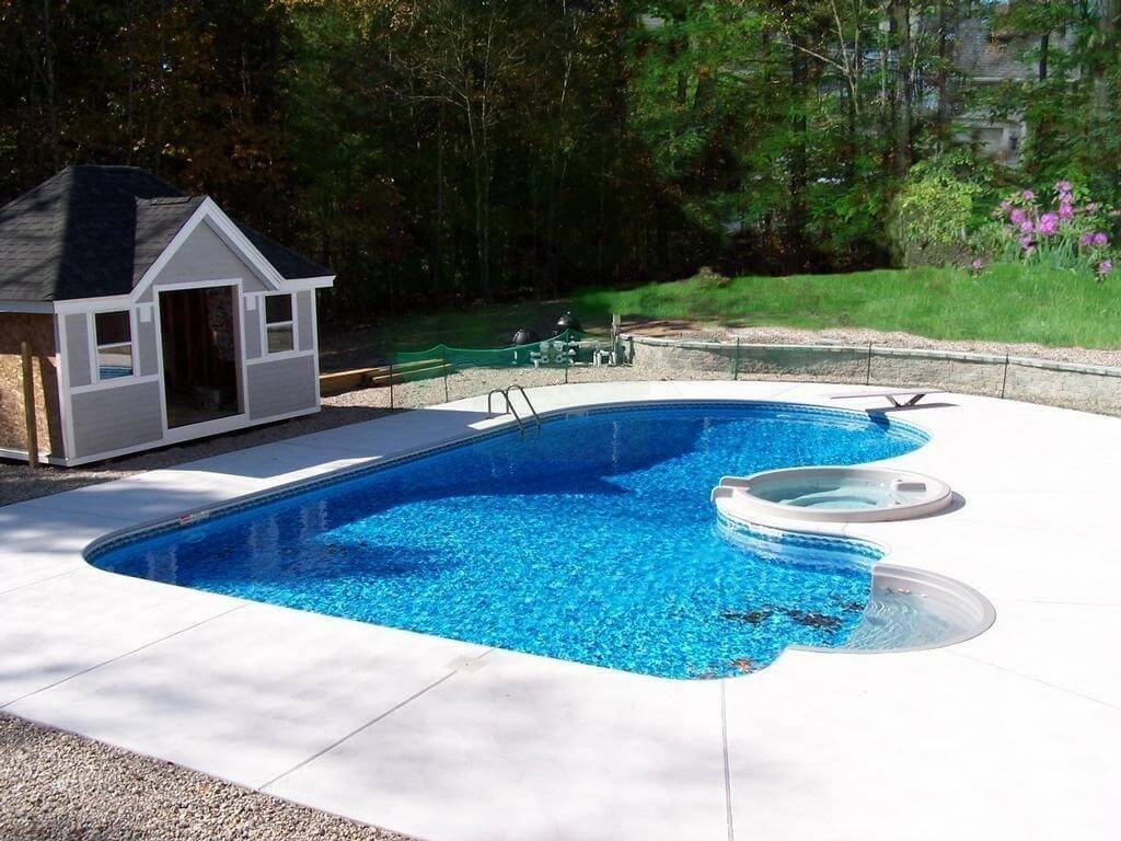 Contemporary Swimming Pool Financing Plan with Large White Paving with Garden Surrounding