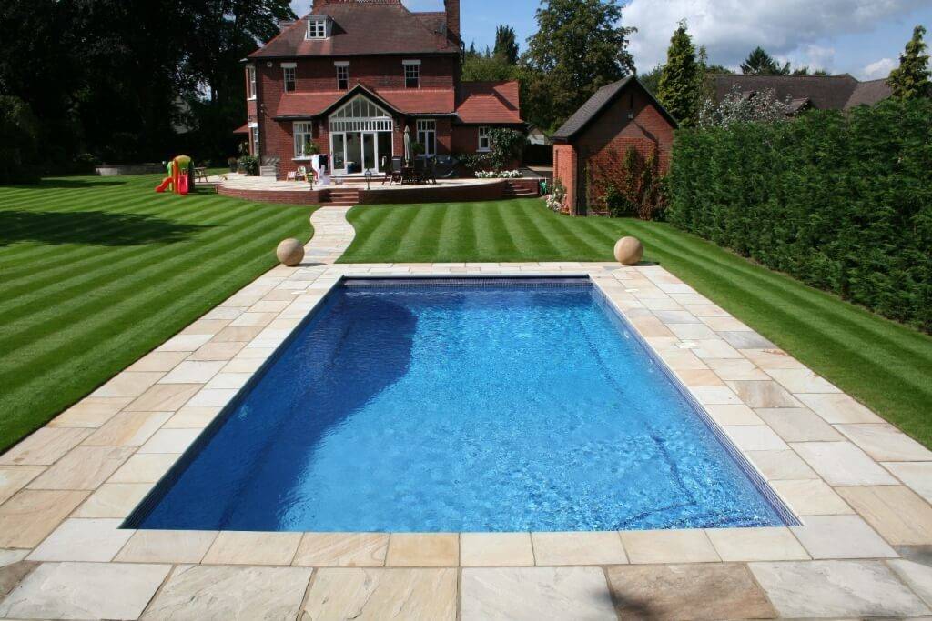 Pool Financing Ideas for Backyard Swimming Pool with Block Paving and Trimmed Garden and Stunning Mountain View