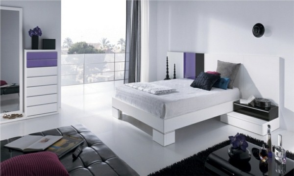lilac accents white walls white furniture small black coffee table