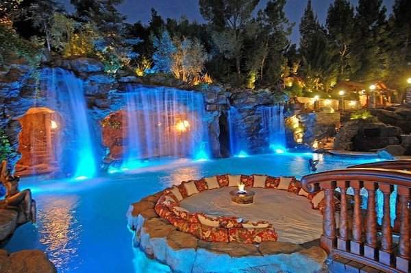 amazing-pools-with-waterfalls-ideas-pool-grotto-bridge-seating-area