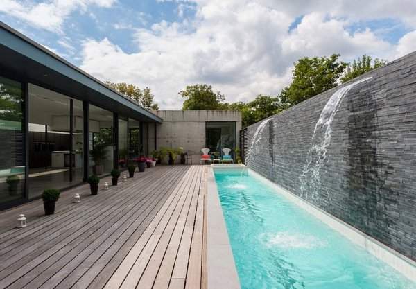 contemporary-patio-rectangular-pool-waterfall-pool-deck-ideas