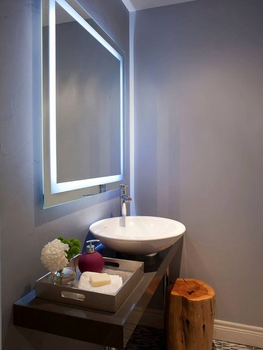 illuminated mirror with shaver socket and demister pad