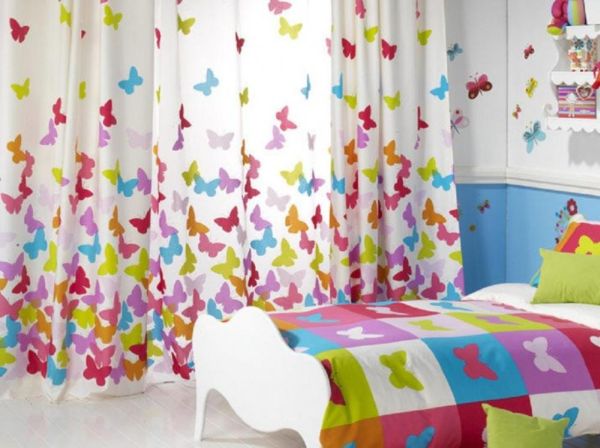 Choose butterfly and doll patterned curtains for girls room