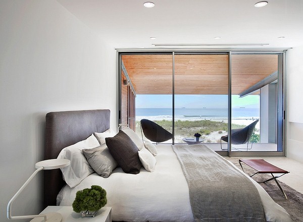 Hint of leather brings elegance to the bedroom with amazing ocean view