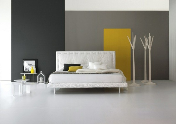 white leather bed dressed gray wall color yellow accents